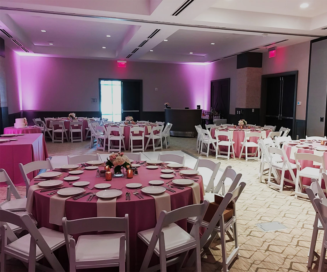 a room with tables and chairs
