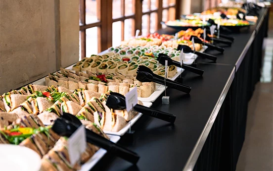 a row of sandwiches on a table