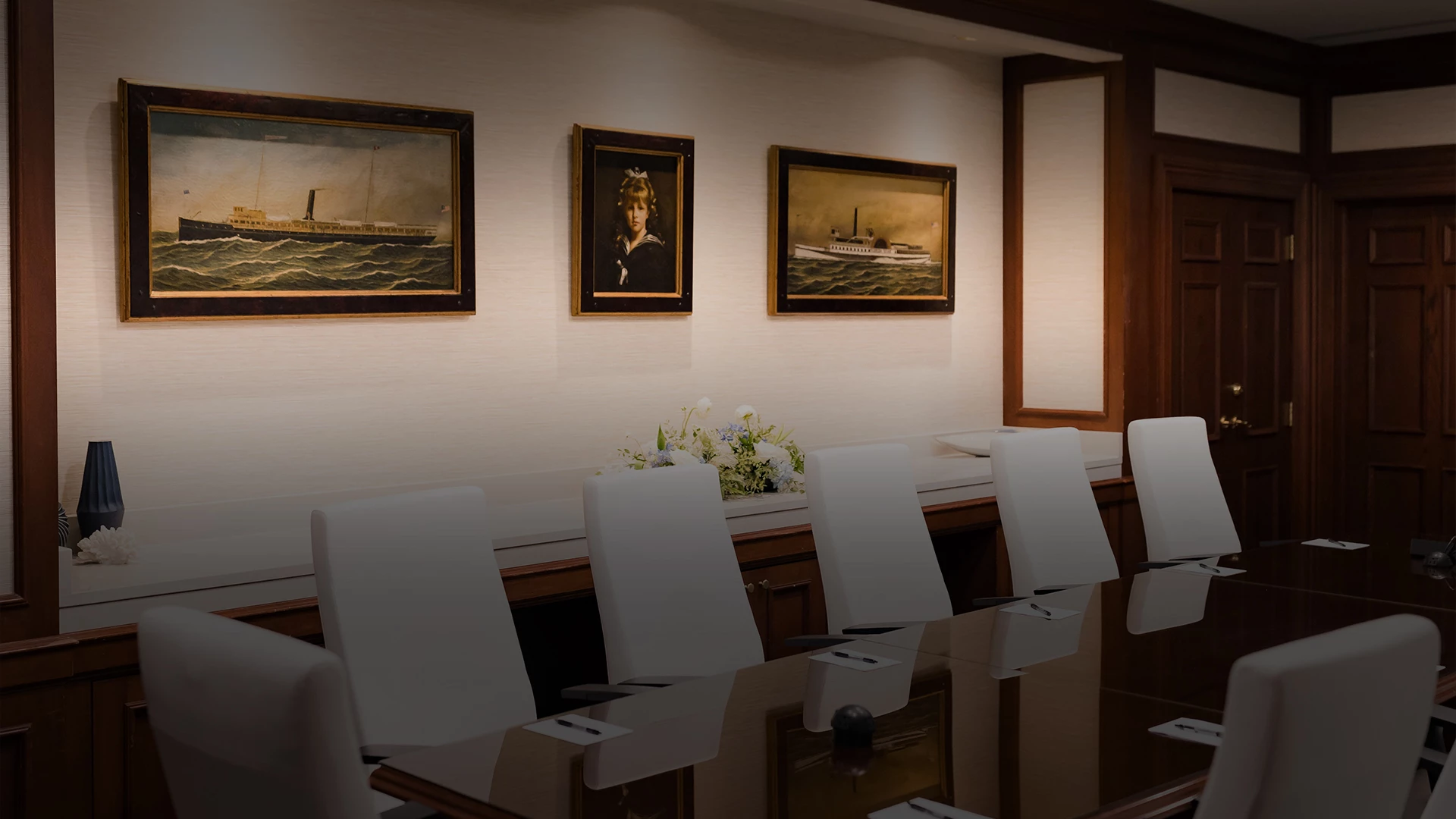 a room with a table and chairs