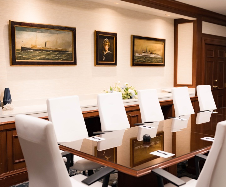 a room with a table and chairs