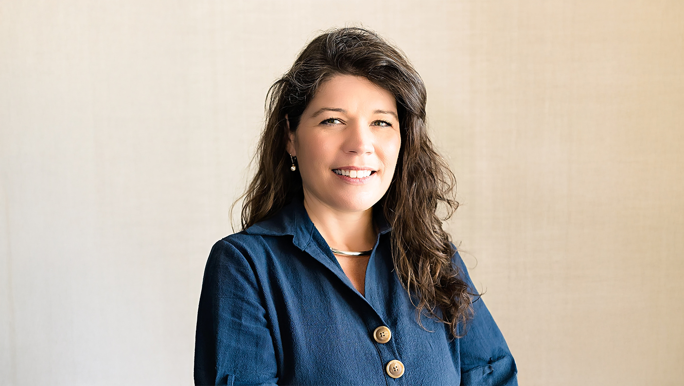 a woman smiling at camera