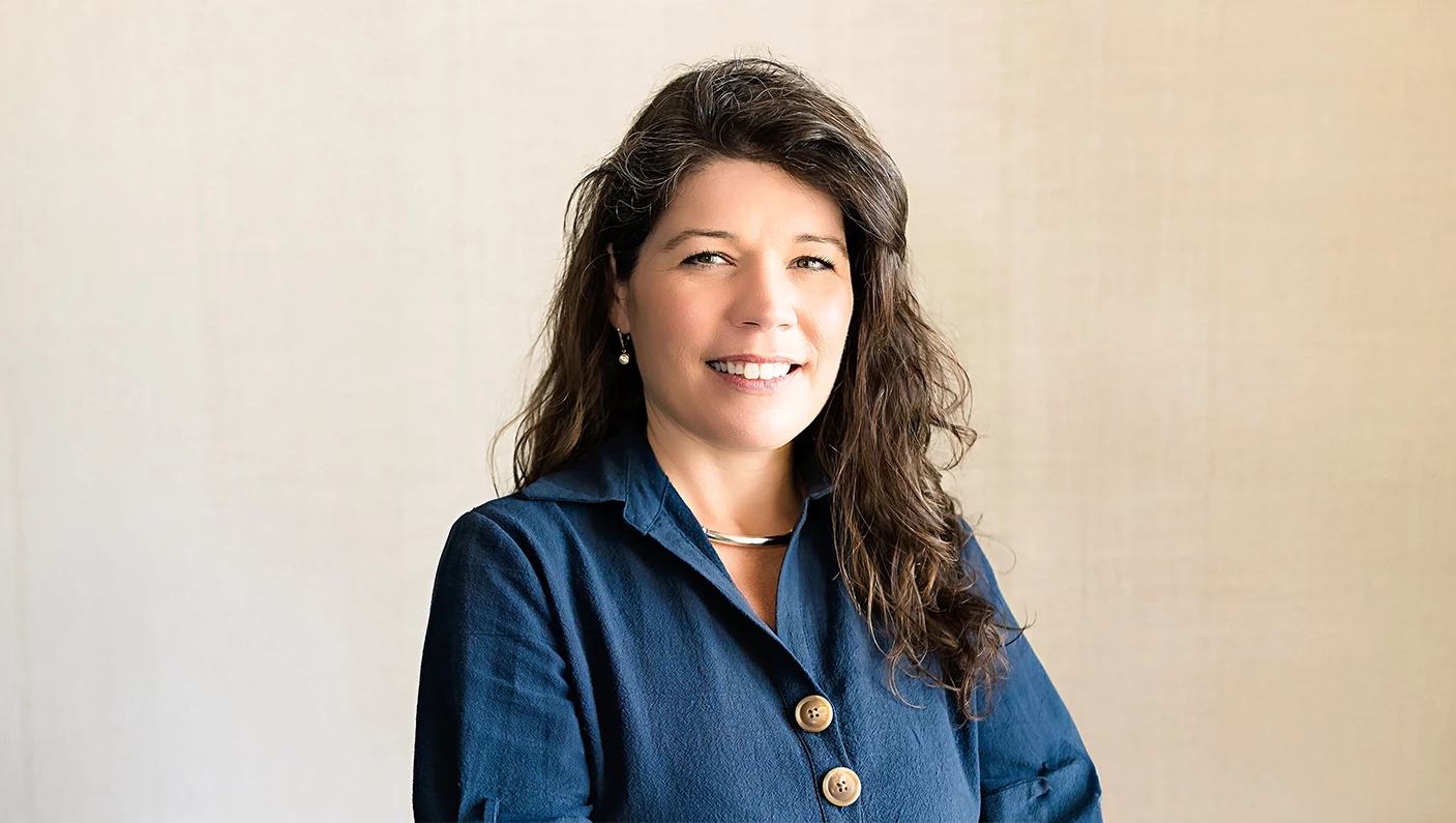 a woman smiling at camera