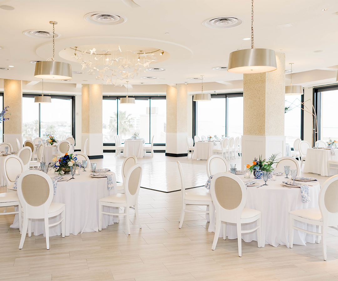 a room with tables and chairs