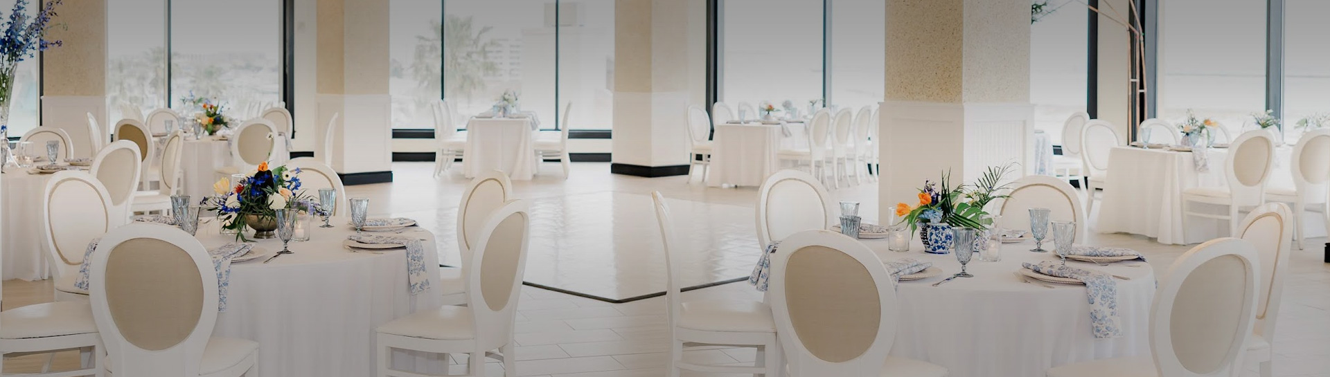 a room with tables and chairs