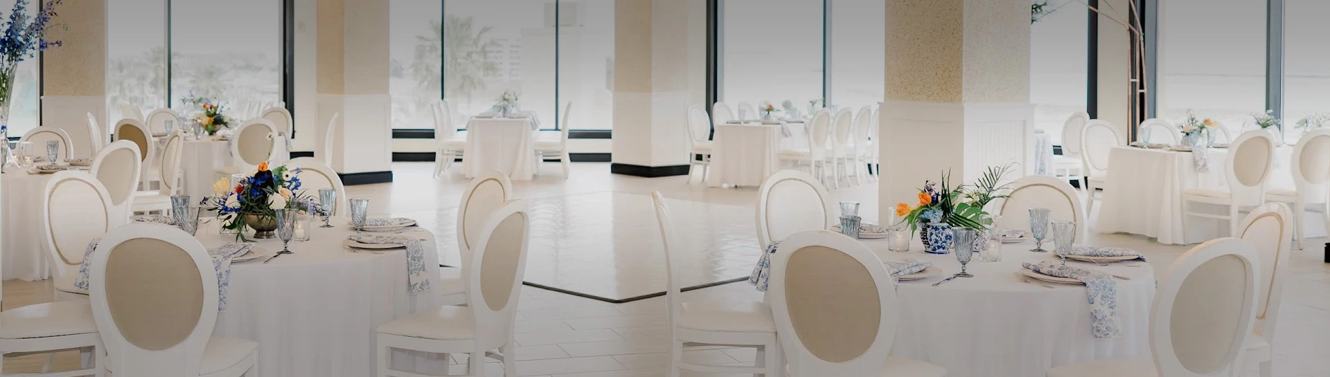 a room with tables and chairs
