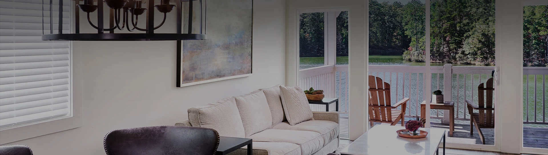 a couch in a room overlooking the lake