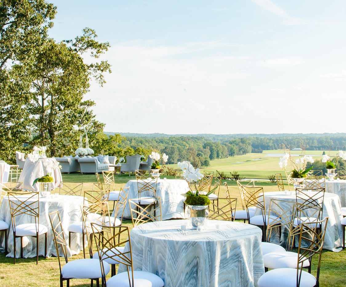 wedding tables set up looking out to a view