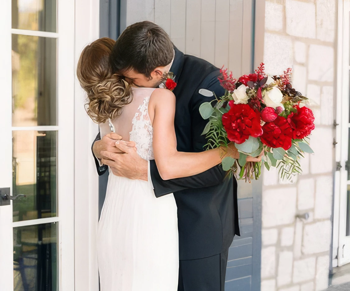 a man and woman kissing