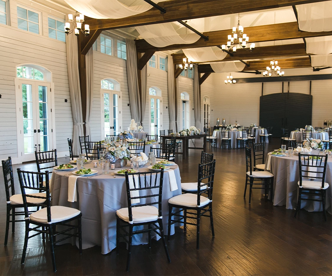 a room with tables and chairs