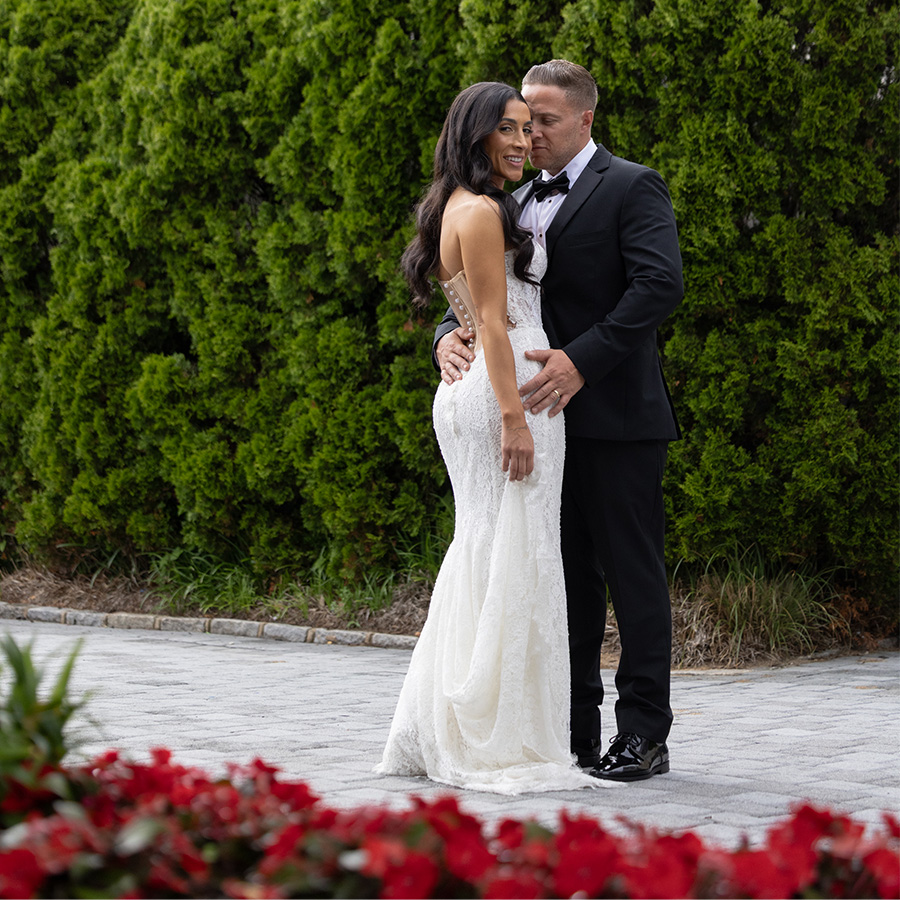 a man and woman in a tuxedo