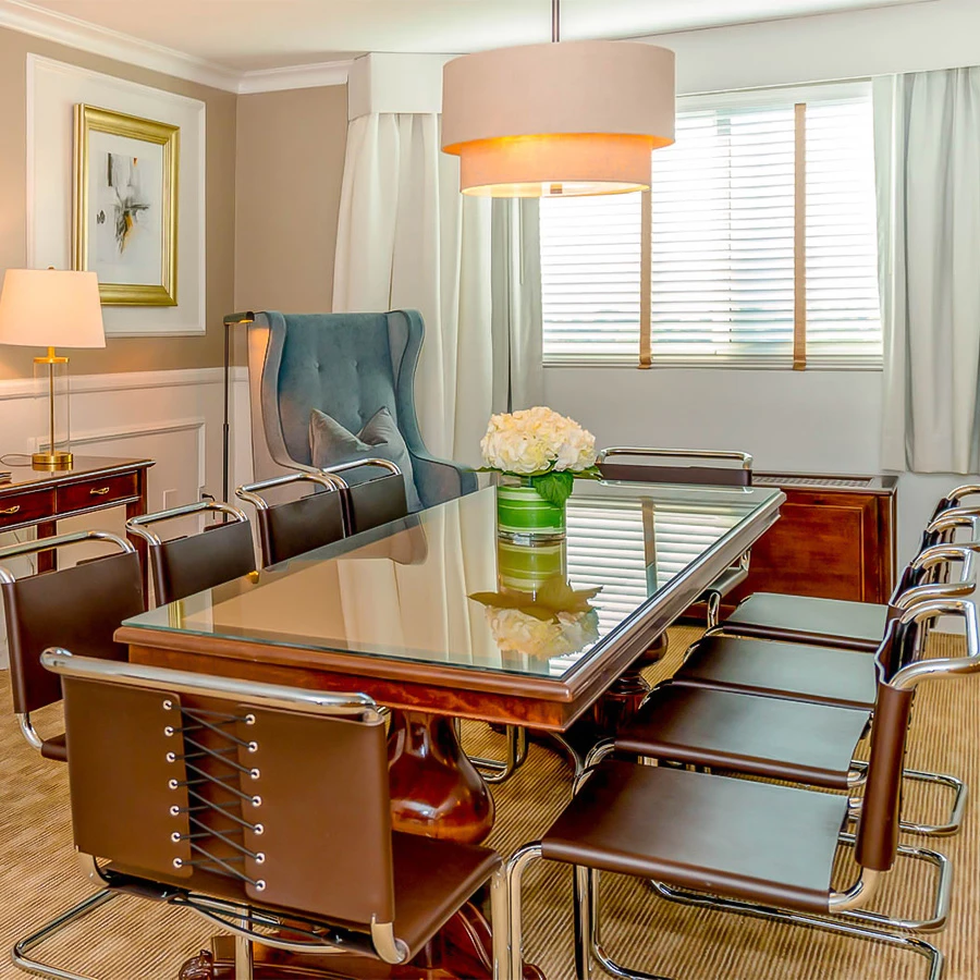 a room with a table and chairs