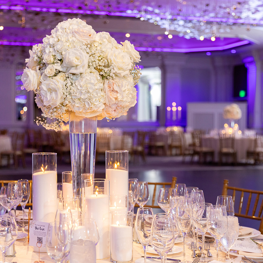 a table set with candles and flowers