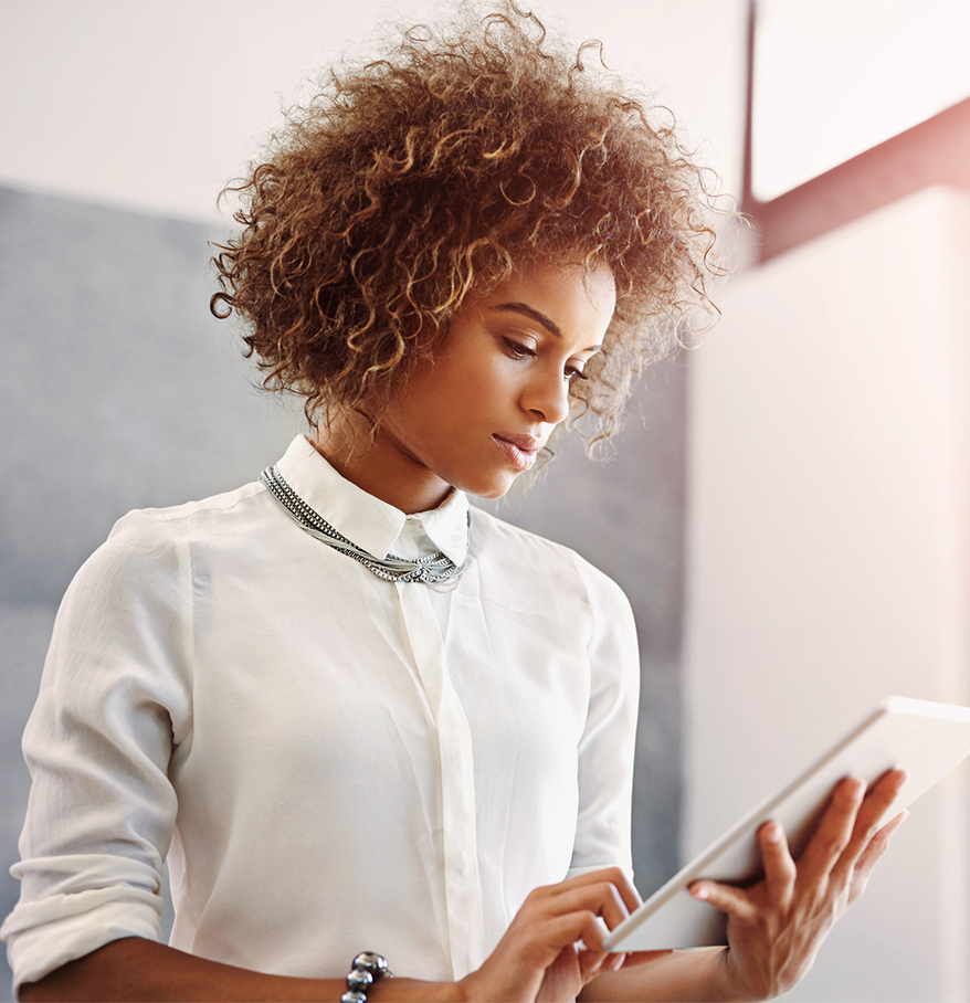 a woman holding a tablet