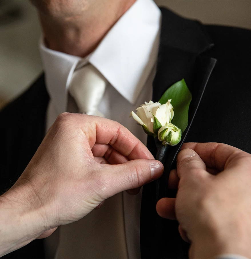 a person wearing a suit and tie