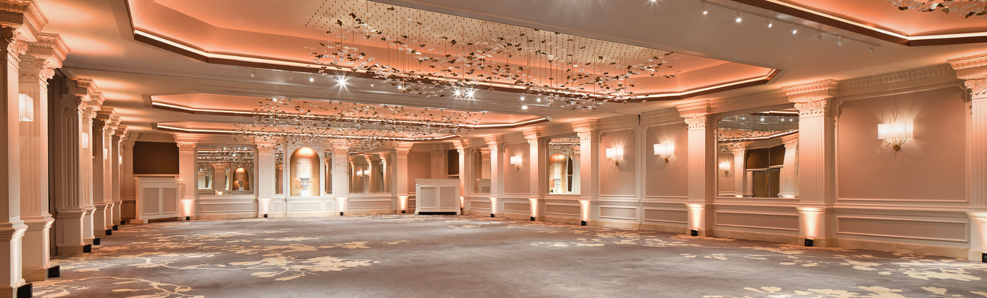 a room with lights and chandeliers