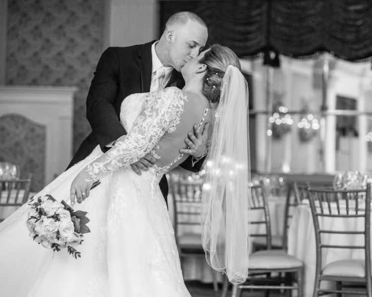 a man and woman kissing
