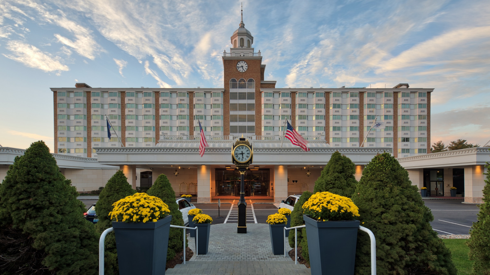 a clock in front of a building