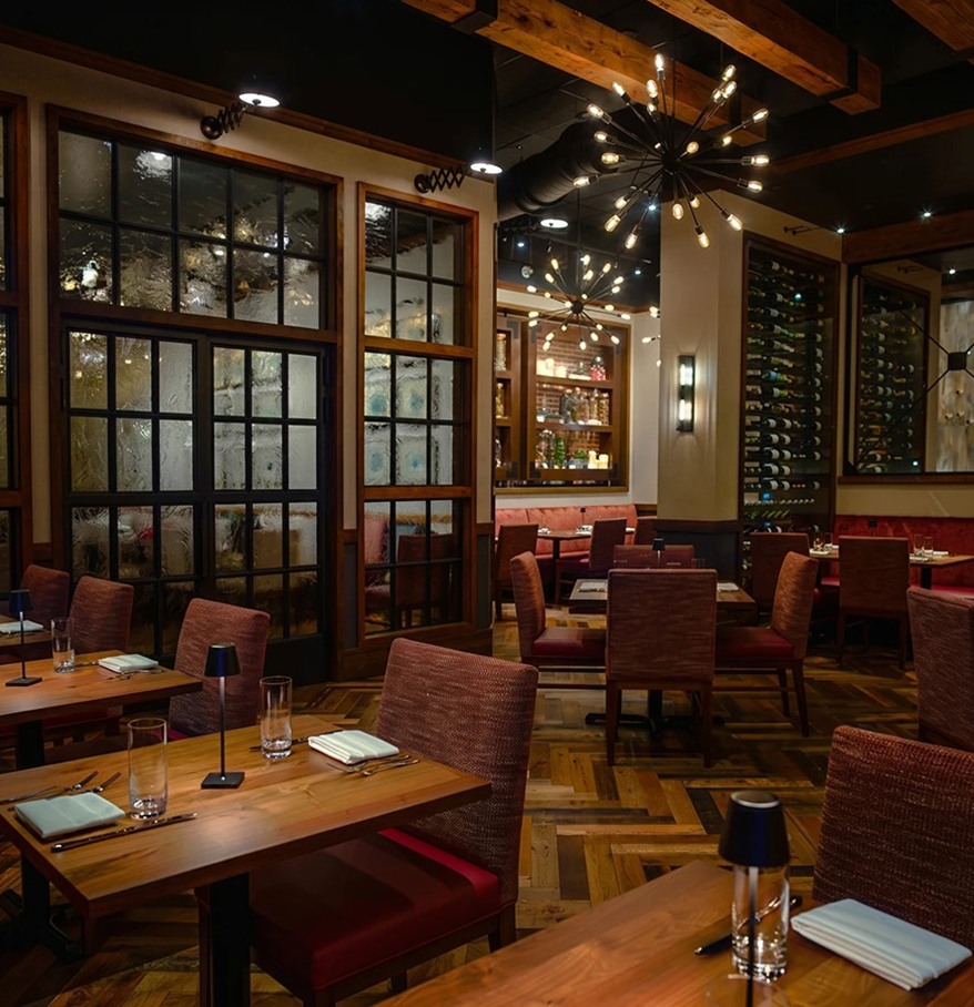 a restaurant with tables and chairs