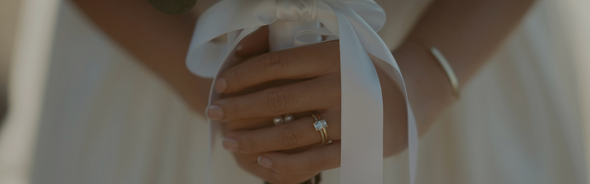 a hand with a ring on it