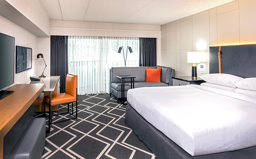 a room with a bed and a couch