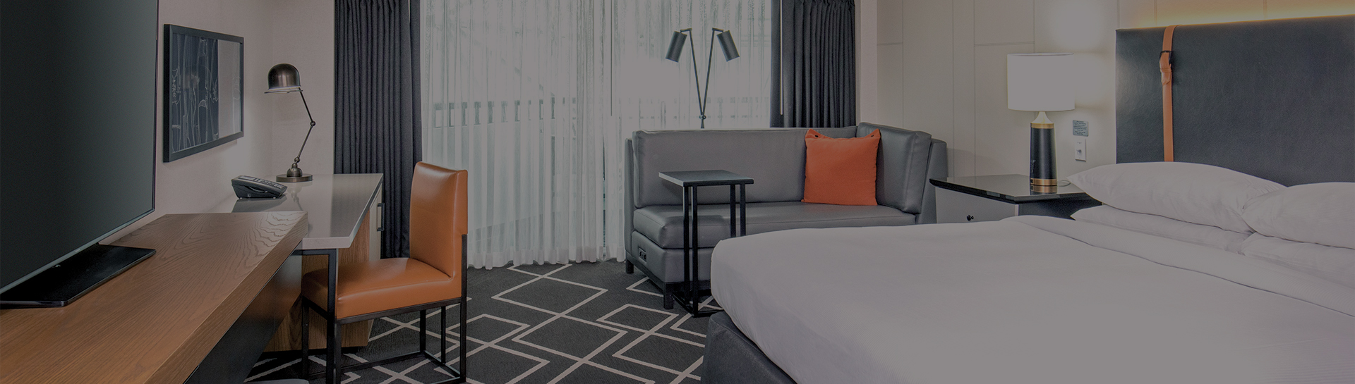 a couch and lamp in a room