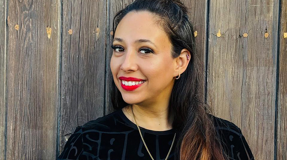 a woman smiling at the camera