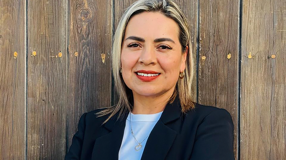 a woman smiling at the camera