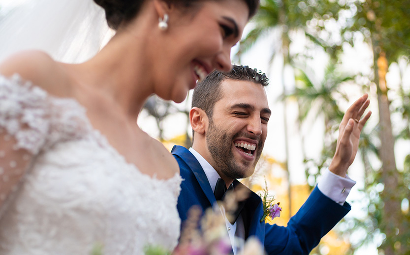 a man and woman smiling