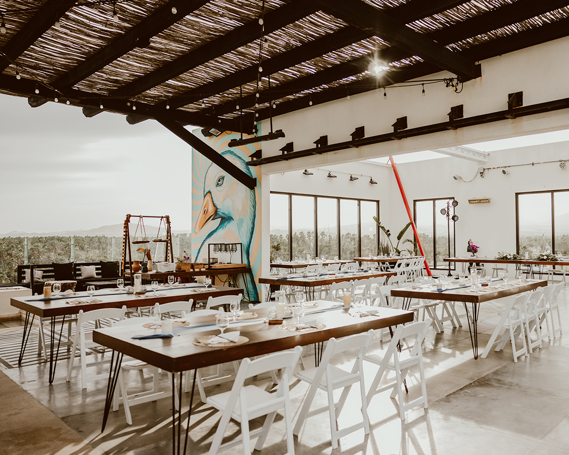 a room with tables and chairs