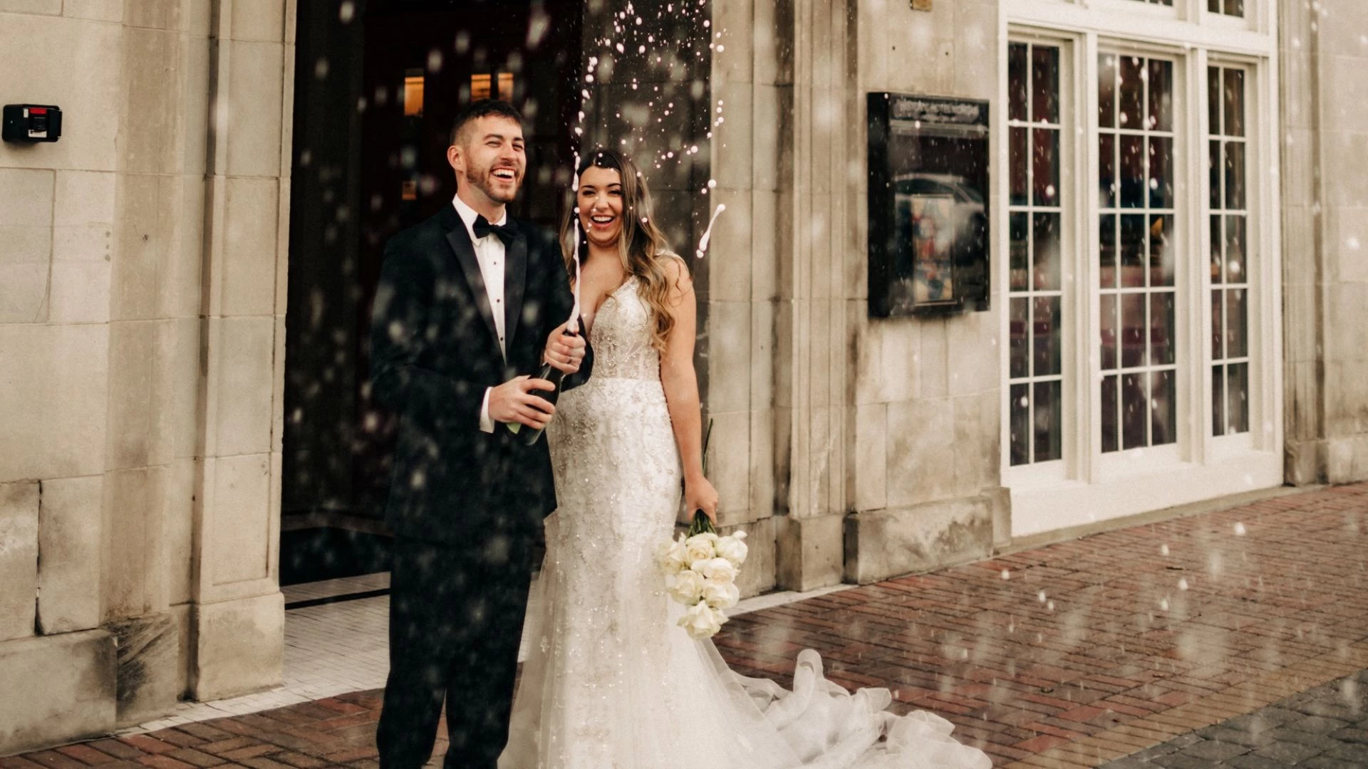 a man and woman in wedding attire