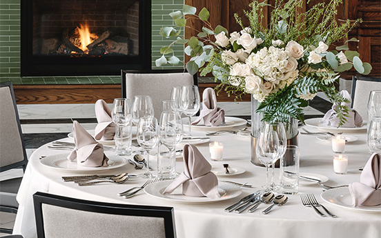 a table set for a wedding dinner