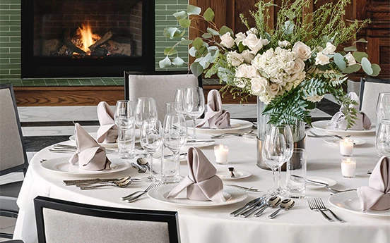 a table set for a wedding dinner