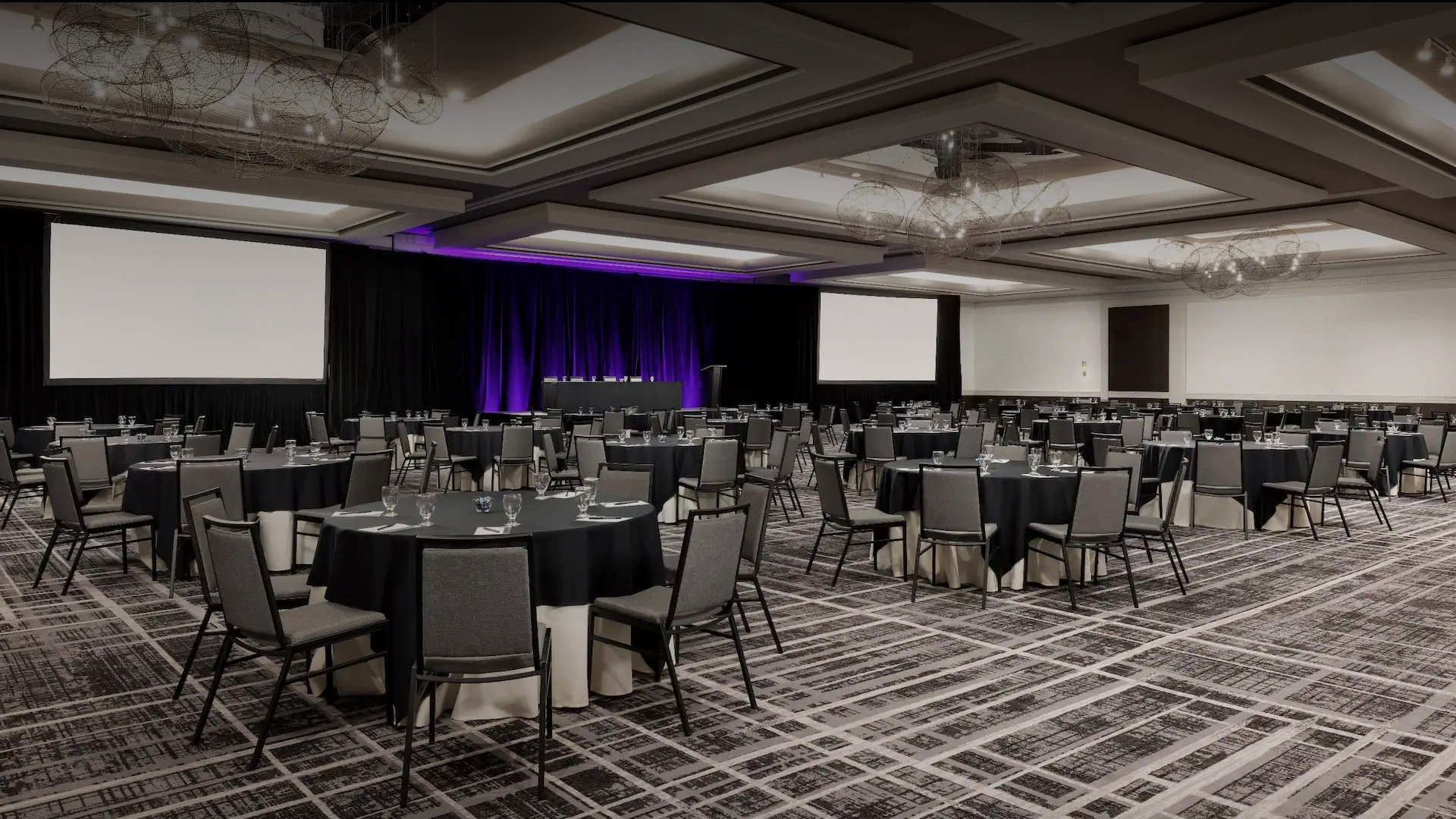 a room with tables and chairs