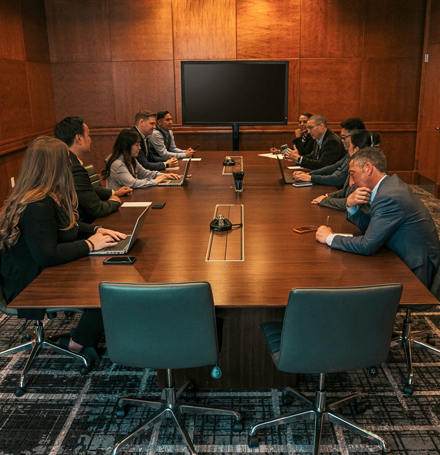 a group of people sitting at a table