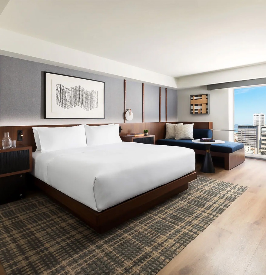 a room with a bed and a window