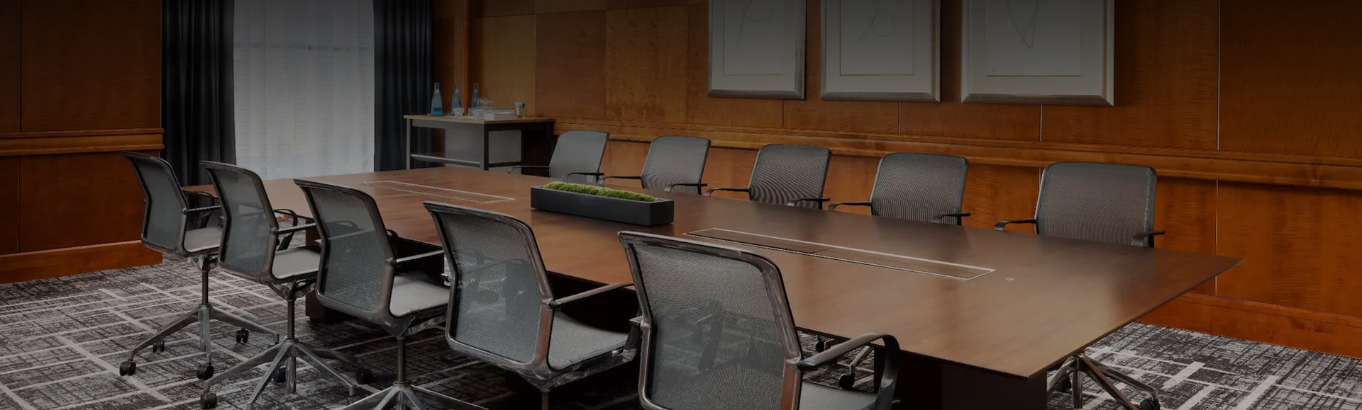 a conference room with chairs and a table