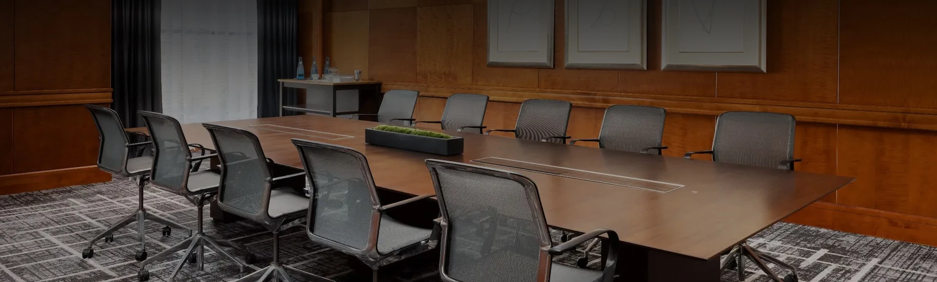 a conference room with chairs and a table