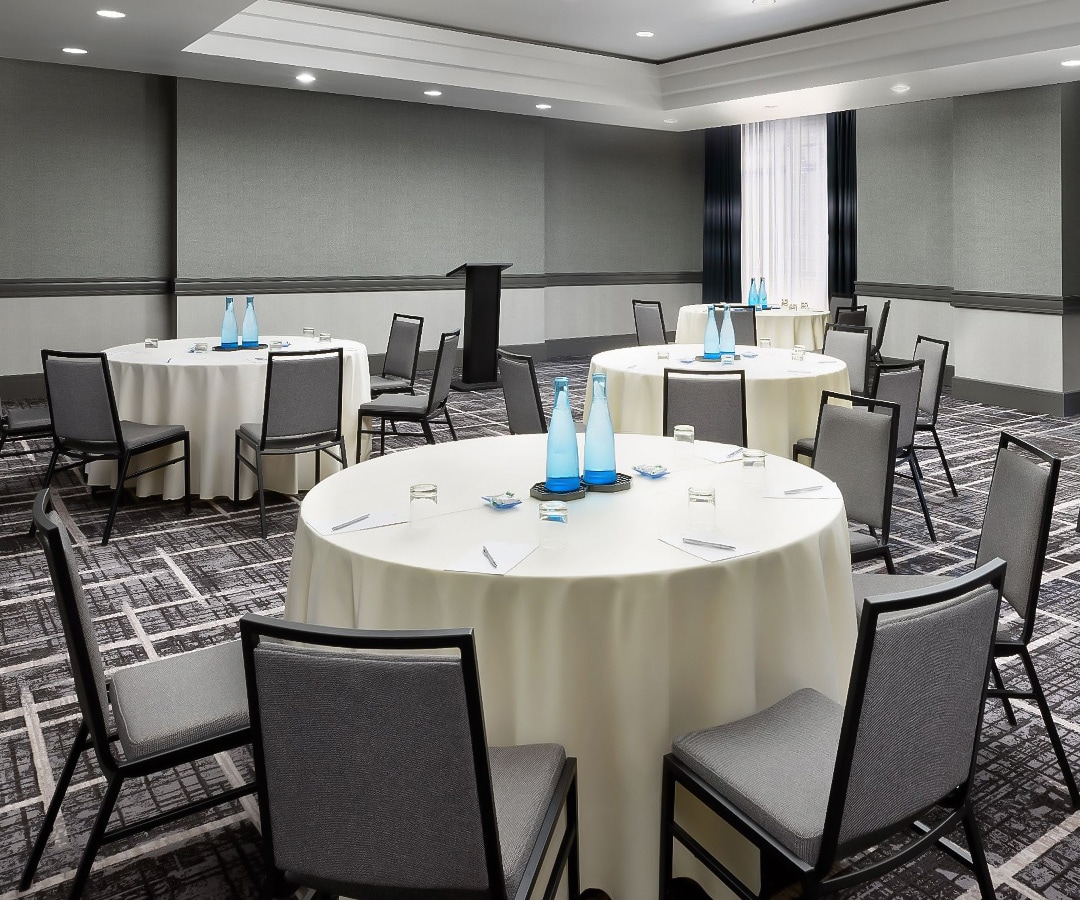 a room with tables and chairs