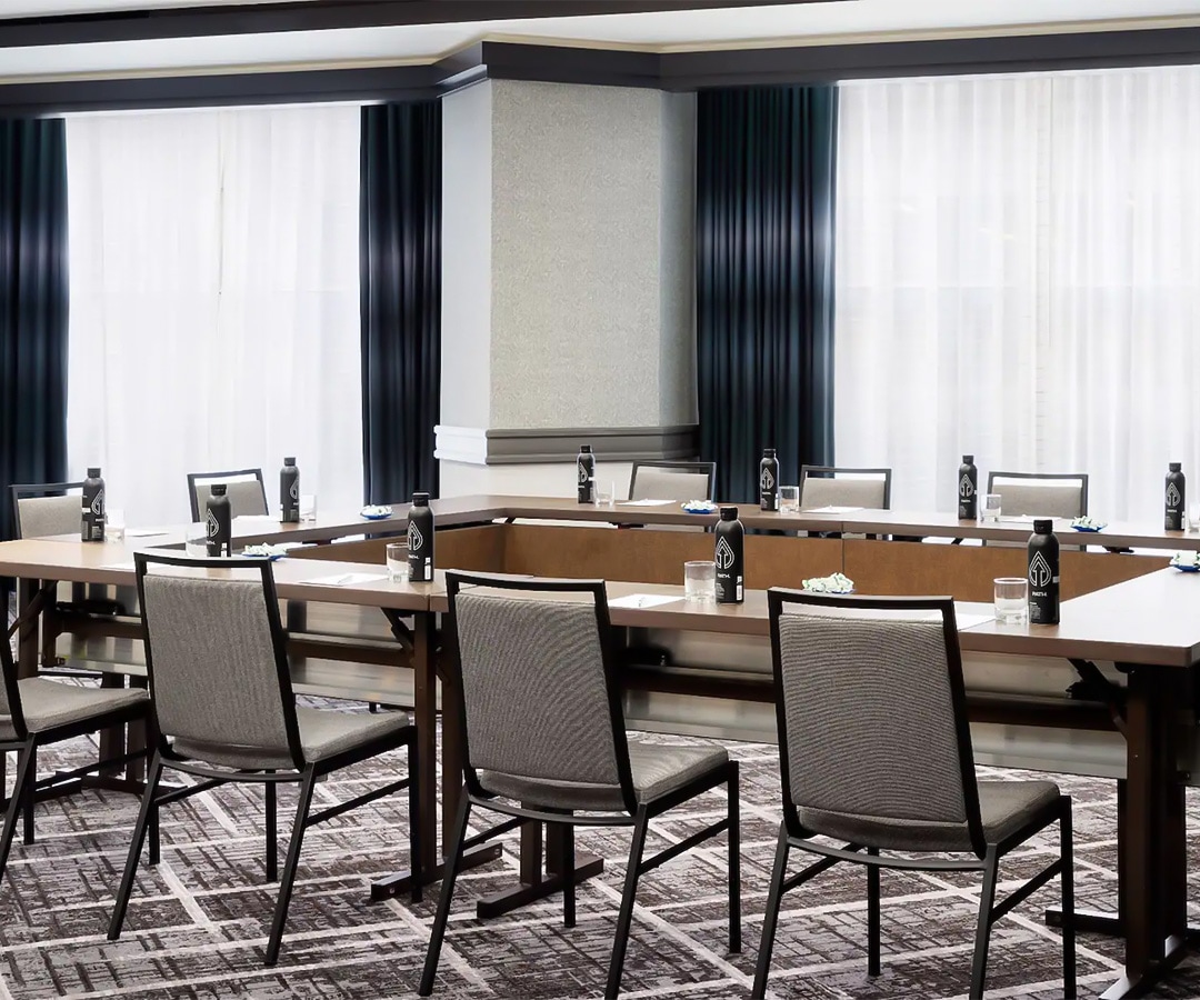 a room with a table and chairs