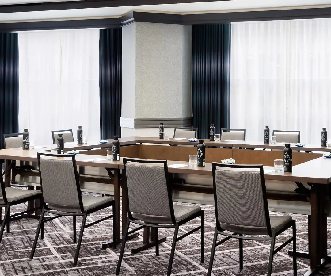 a room with a table and chairs