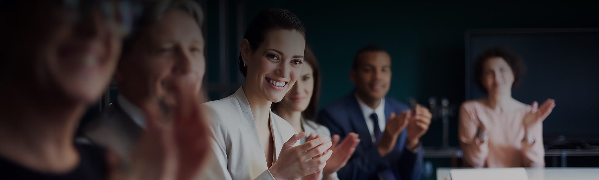 a group of people clapping
