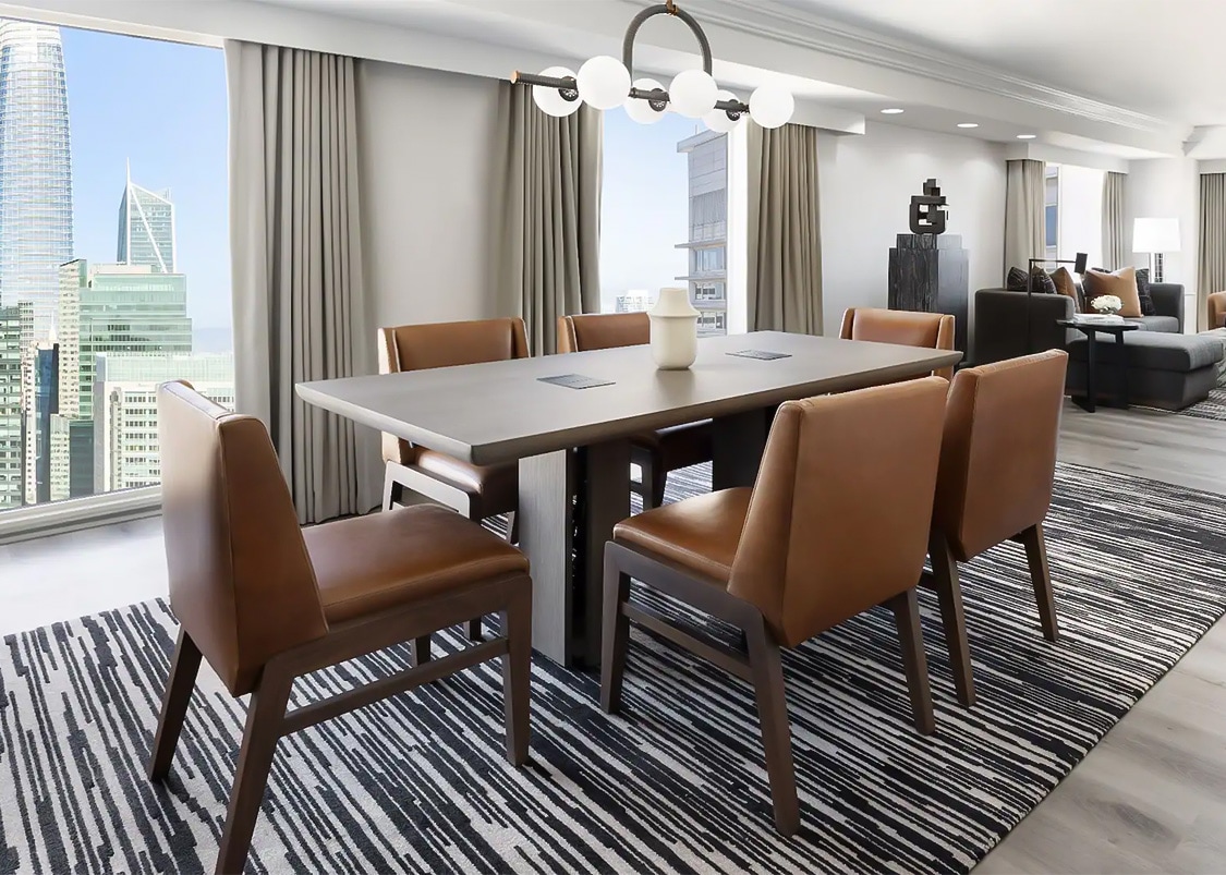 a room with a table and chairs