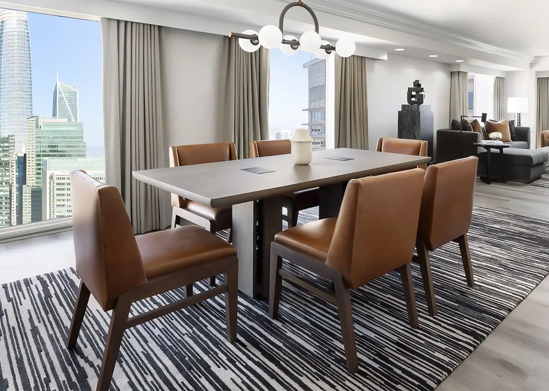 a room with a table and chairs