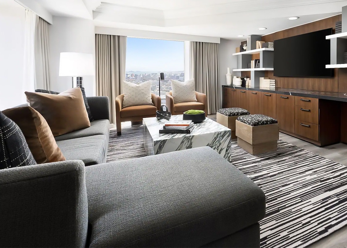 a living room with a television and a couch