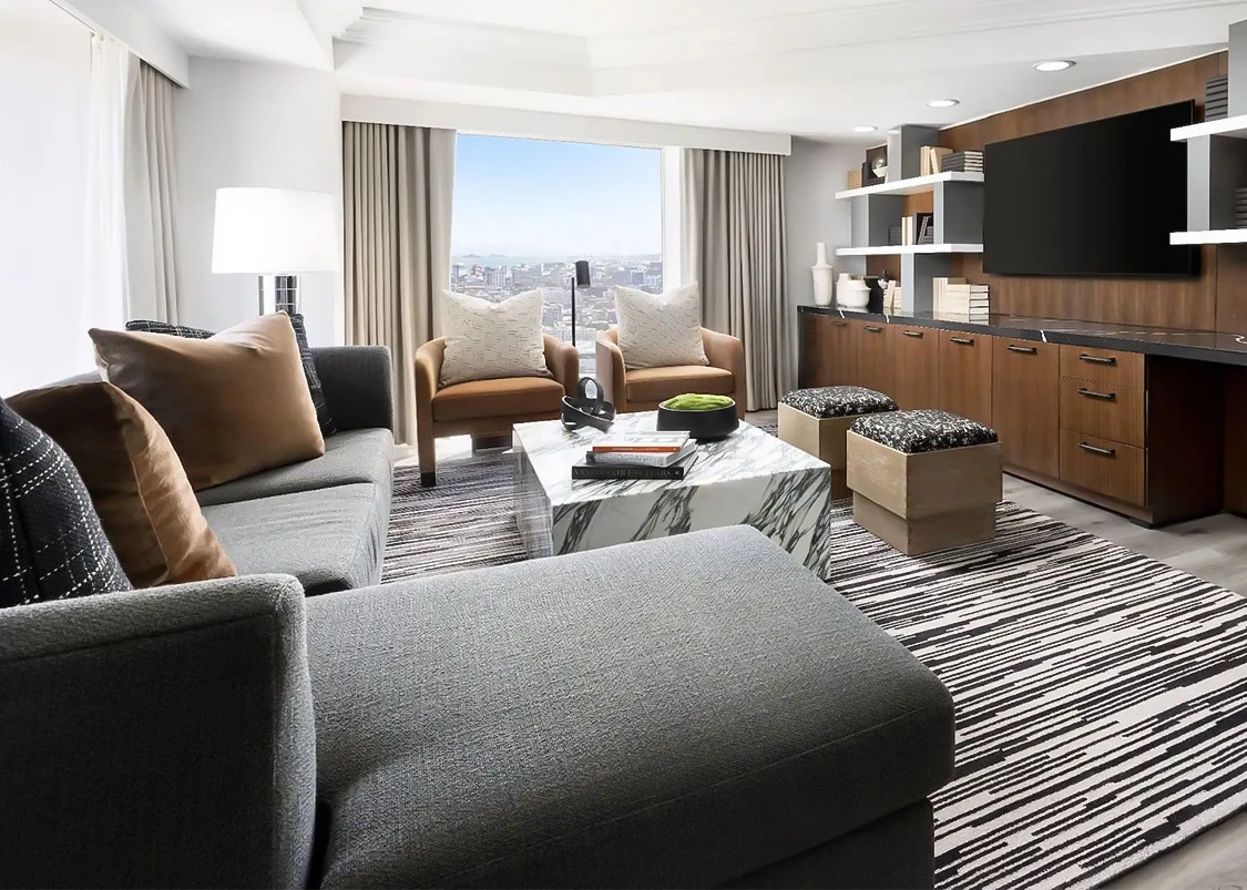 a living room with a television and a couch