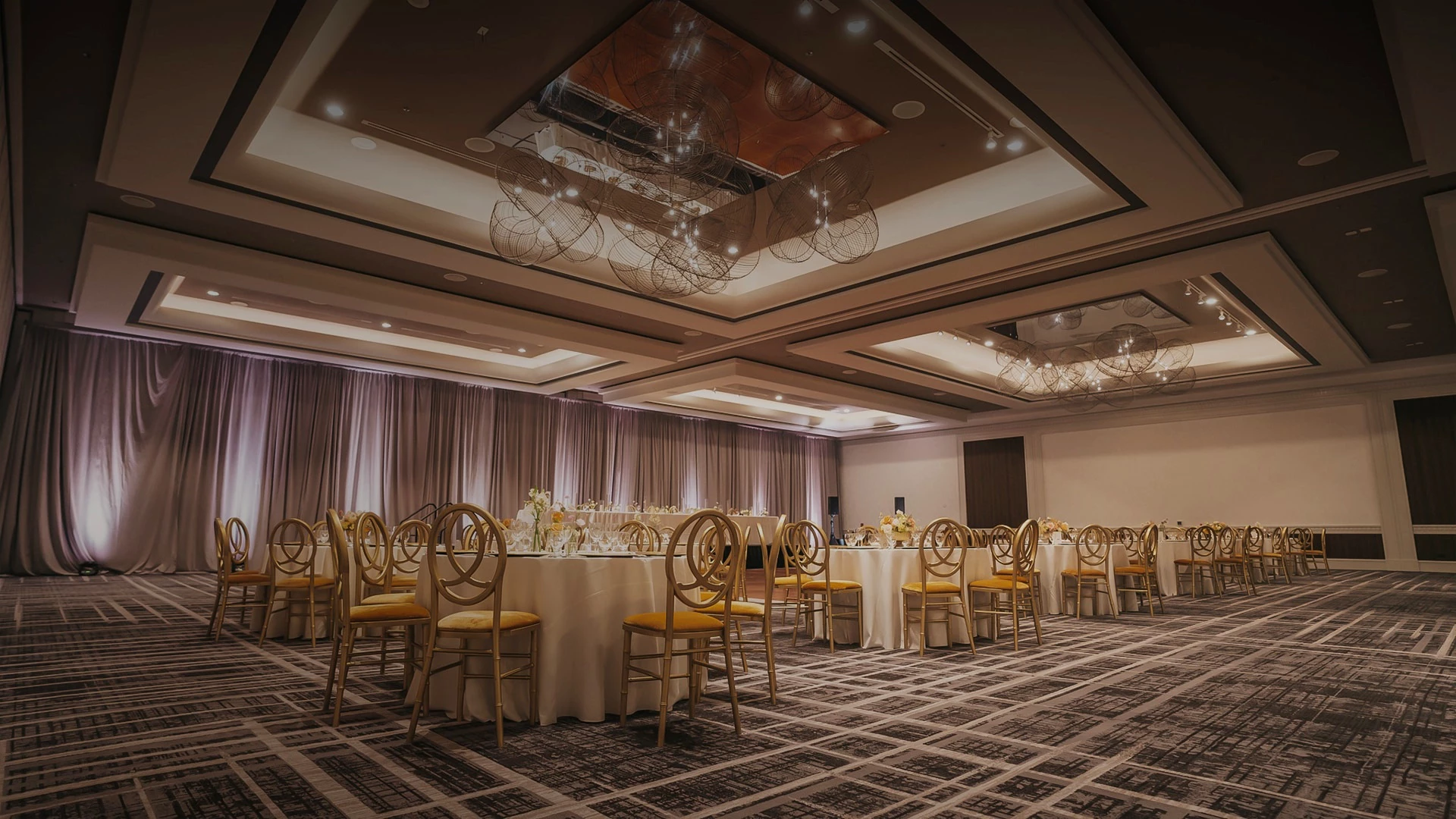 a room with tables and chairs