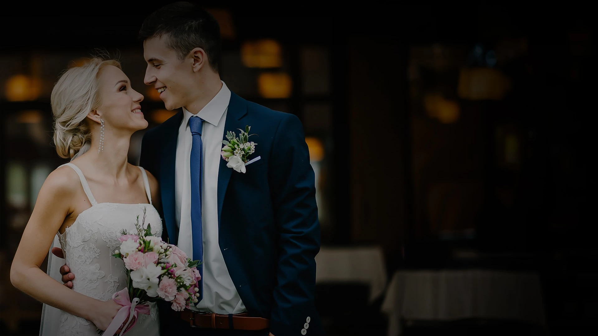 a man and woman in a suit and tie