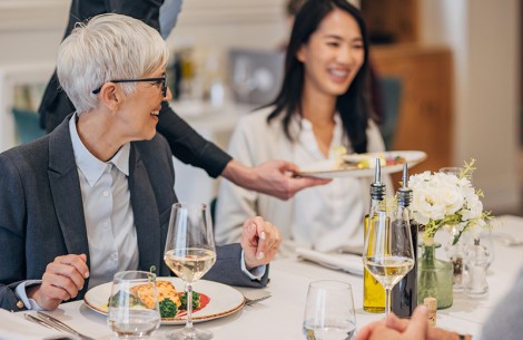 a group of people at a restaurant