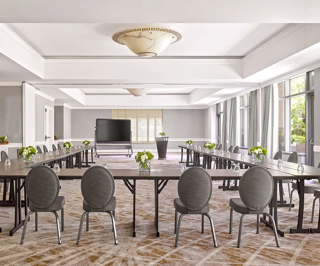 a room with tables and chairs