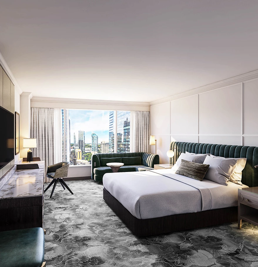 a room with a bed and a television